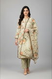 A woman modeling a traditional three-piece salwar kameez suit in a light beige and sage green floral print, featuring a long kurta with a matching dupatta and trousers, set against a plain gray studio background.